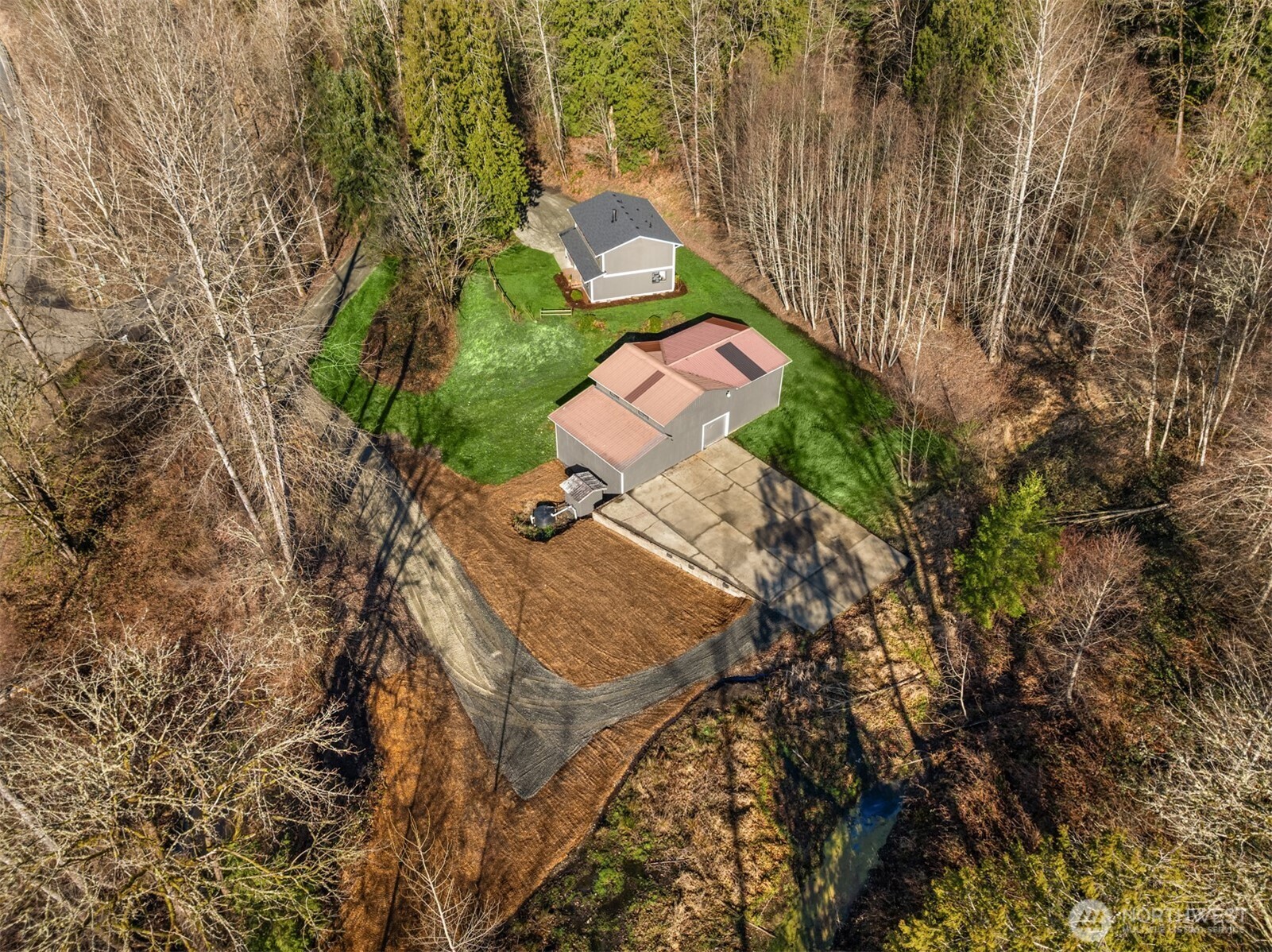 10304 296th Avenue Northeast Carnation, WA 98014 - Photo 2 of 35 an aerial view of a house with a yard