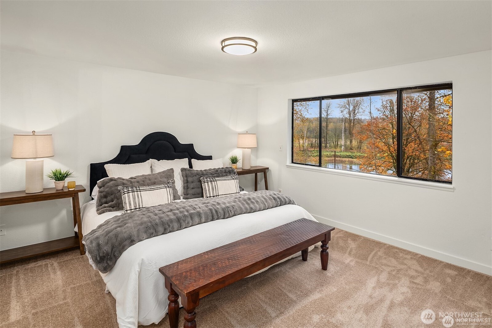 10304 296th Avenue Northeast Carnation, WA 98014 - Photo 25 of 35 a bedroom with a bed and window