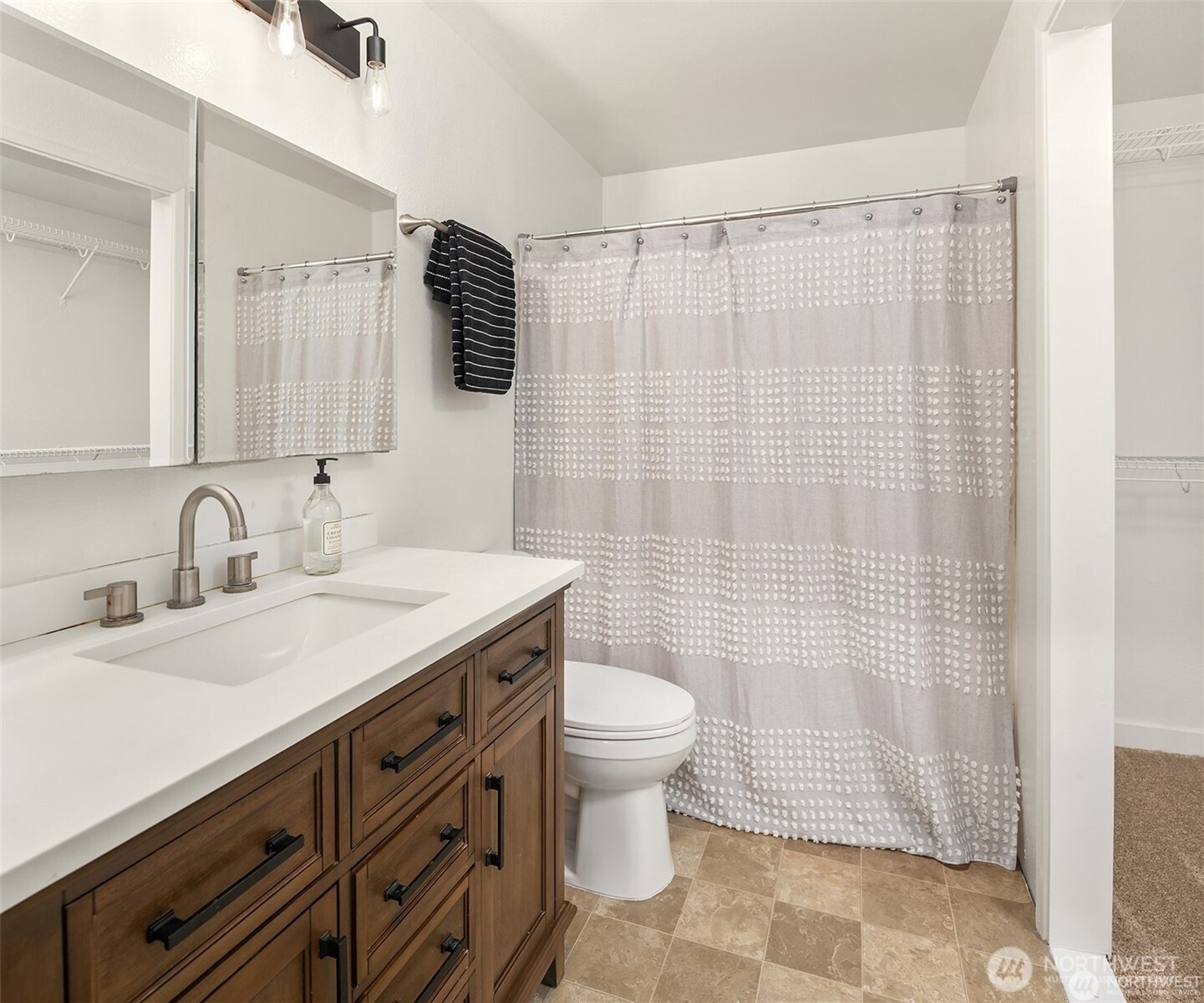 10304 296th Avenue Northeast Carnation, WA 98014 - Photo 26 of 35 a bathroom with a sink toilet and shower