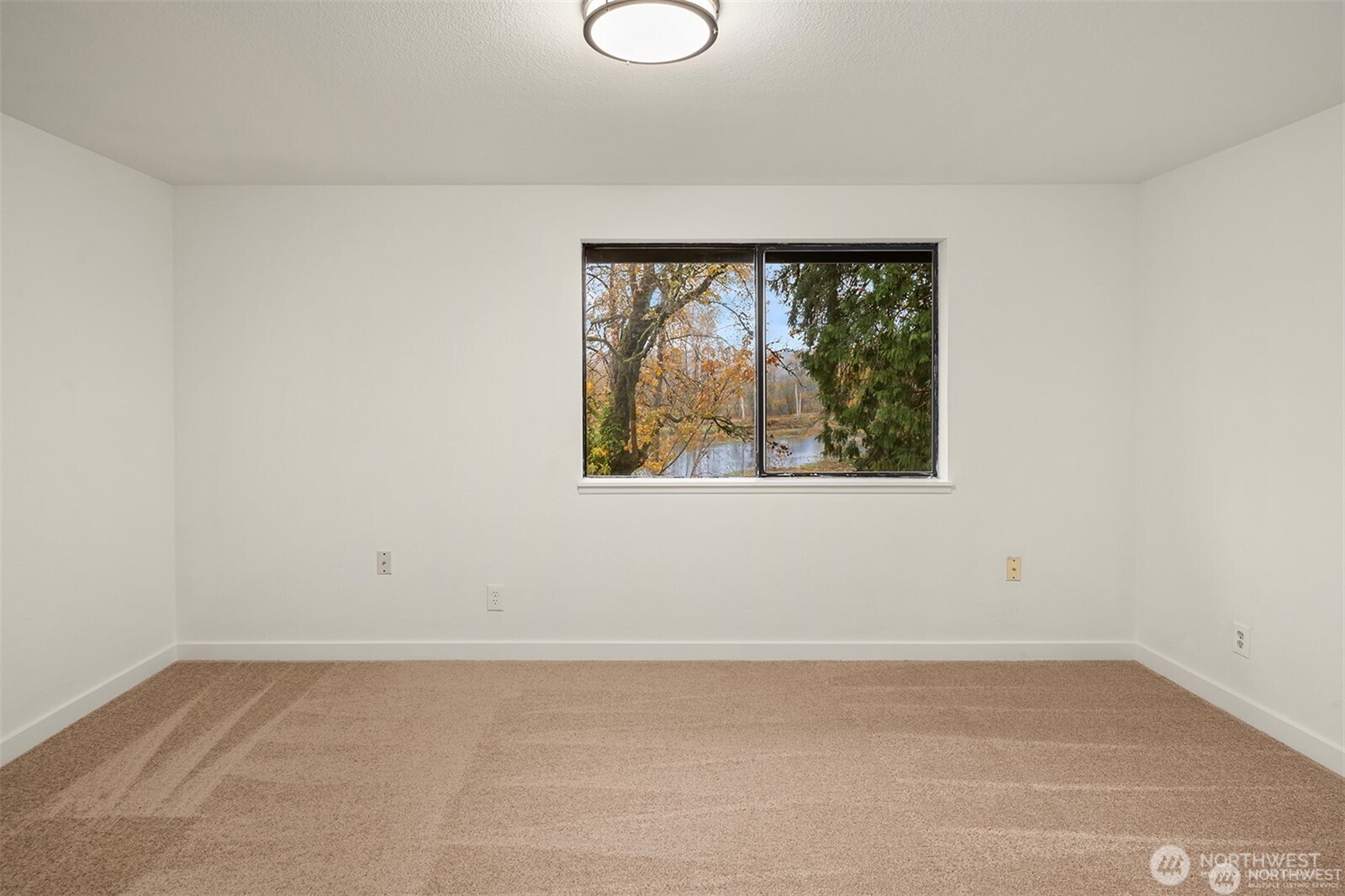 10304 296th Avenue Northeast Carnation, WA 98014 - Photo 27 of 35 an empty room with a window