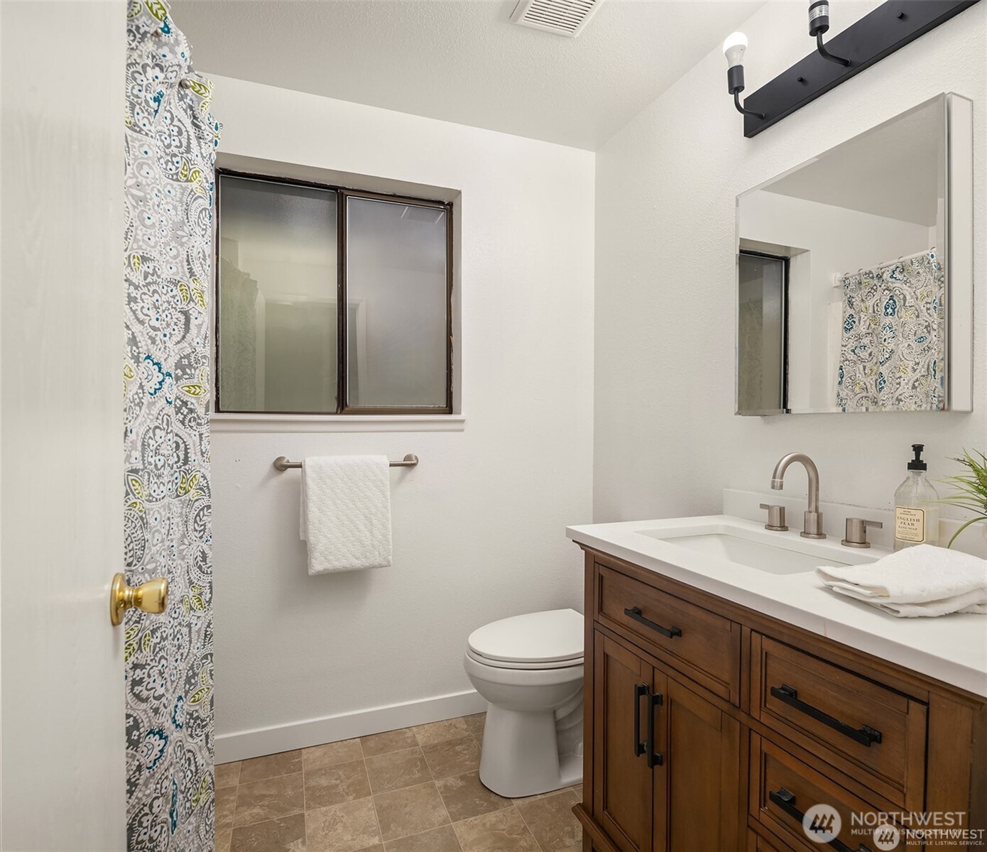 10304 296th Avenue Northeast Carnation, WA 98014 - Photo 28 of 35 a bathroom with a toilet sink and mirror