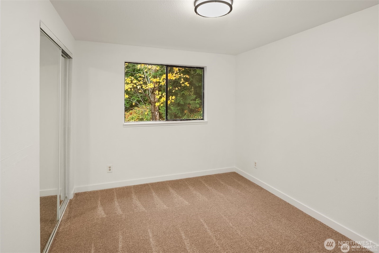 10304 296th Avenue Northeast Carnation, WA 98014 - Photo 29 of 35 an empty room with a window