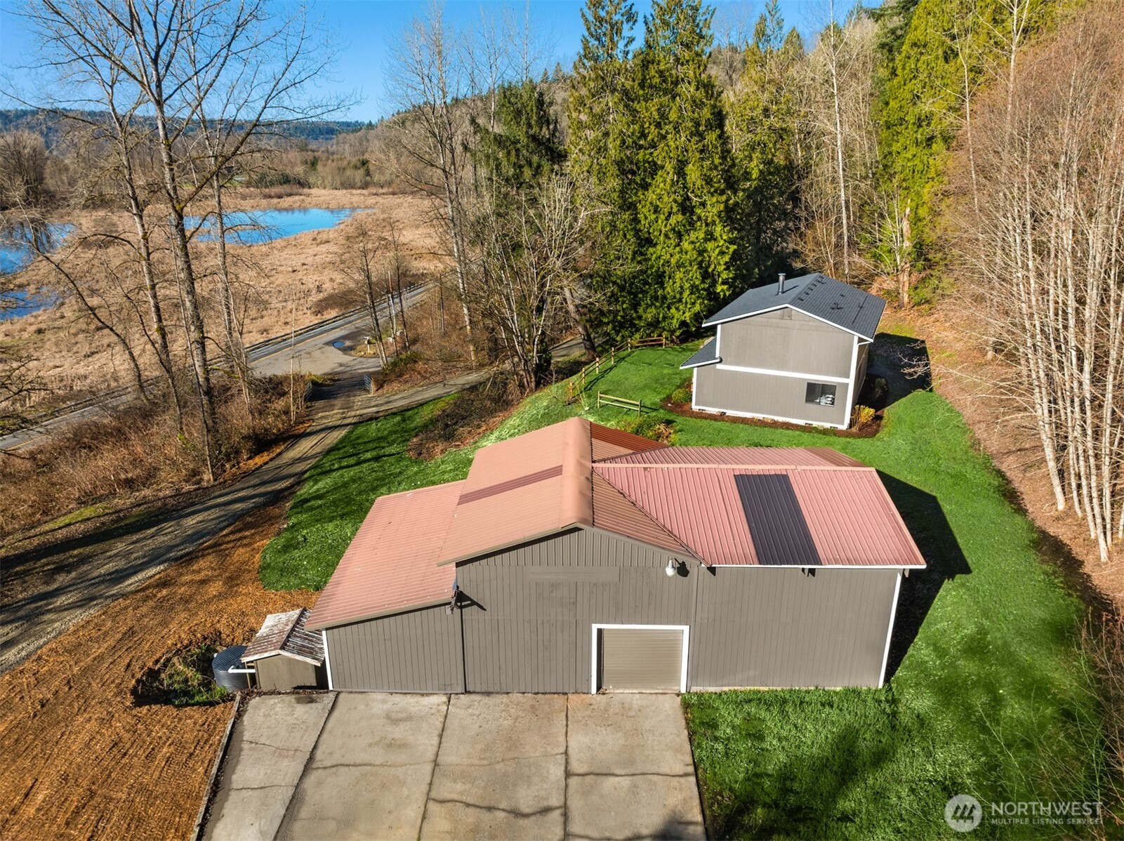 10304 296th Avenue Northeast Carnation, WA 98014 - Photo 3 of 35 an aerial view of a house with yard