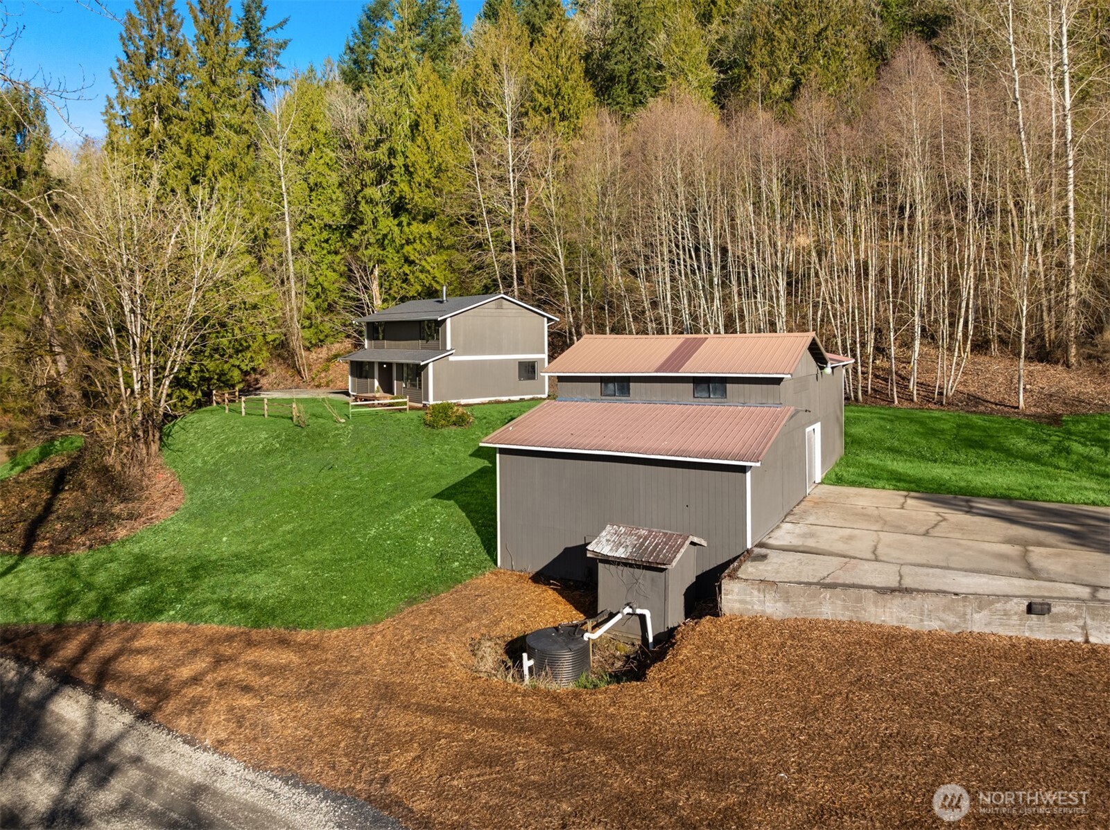 10304 296th Avenue Northeast Carnation, WA 98014 - Photo 4 of 35 an aerial view of a house with a yard