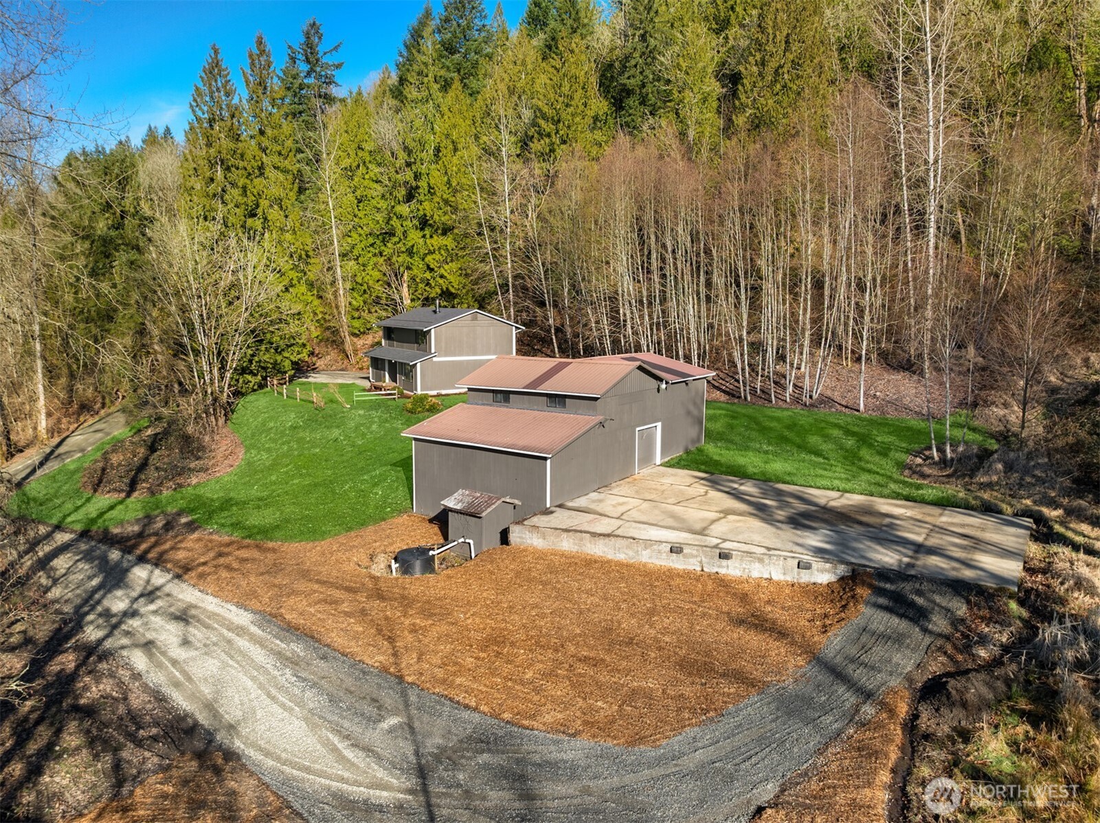 10304 296th Avenue Northeast Carnation, WA 98014 - Photo 5 of 35 a view of a backyard with a patio