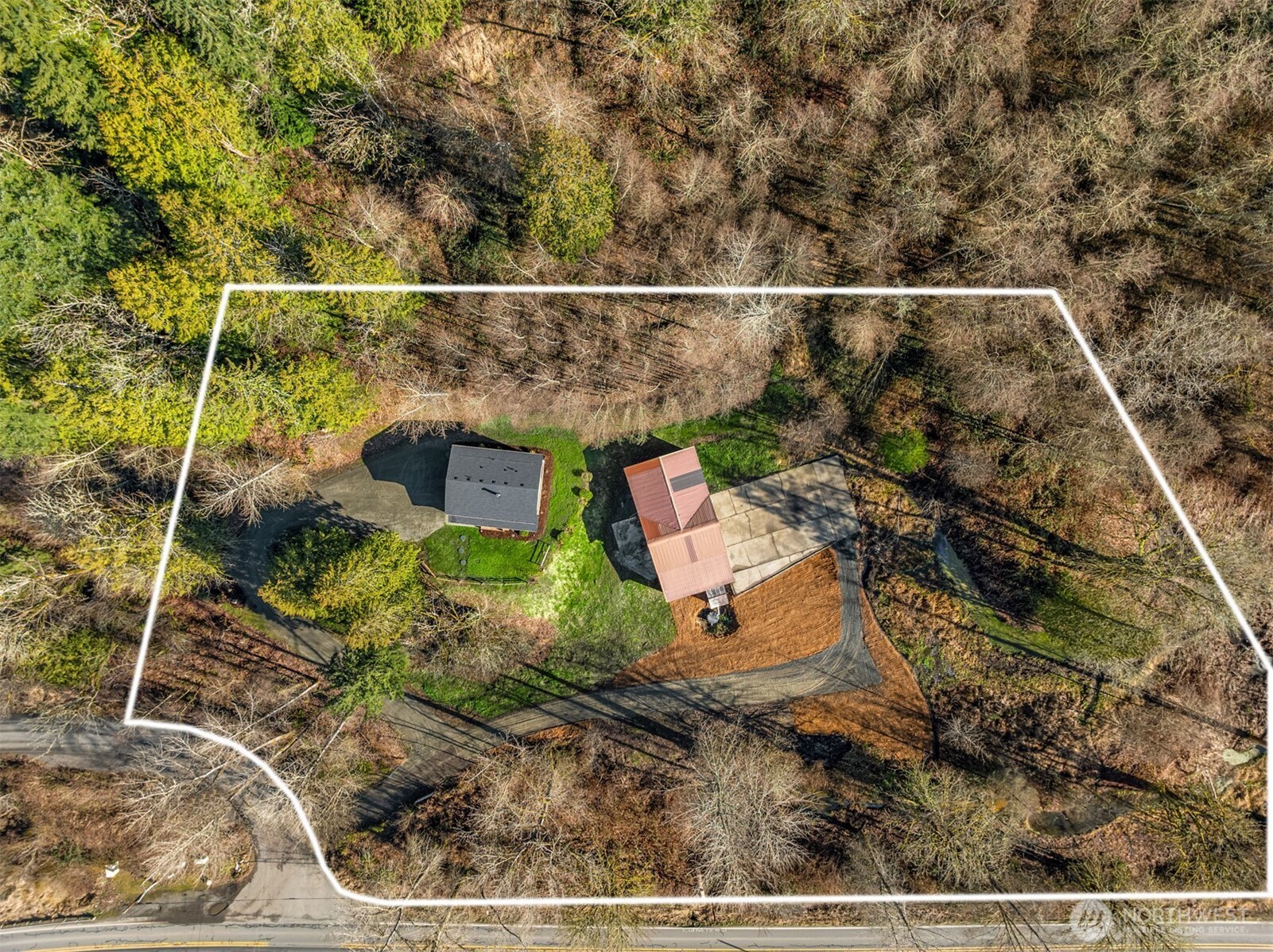 10304 296th Avenue Northeast Carnation, WA 98014 - Photo 8 of 35 an aerial view of a house with a yard