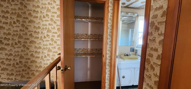 a bathroom with a sink and toilet