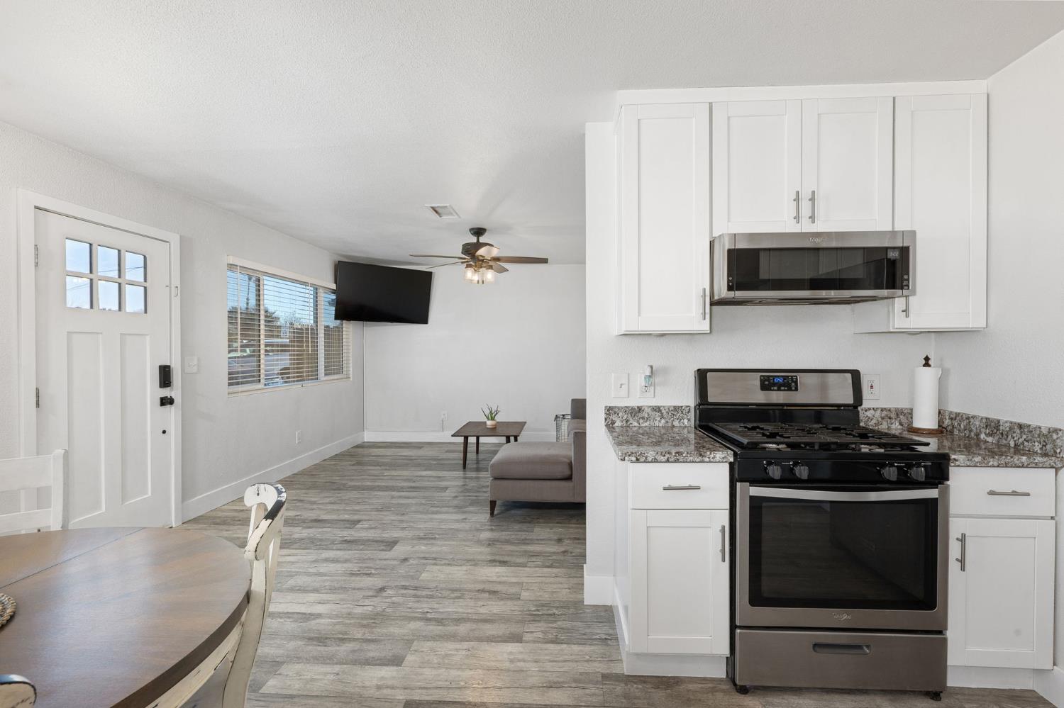 30 3rd Avenue Isleton, CA 95641 - Photo 12 of 42 a kitchen with a stove and a microwave