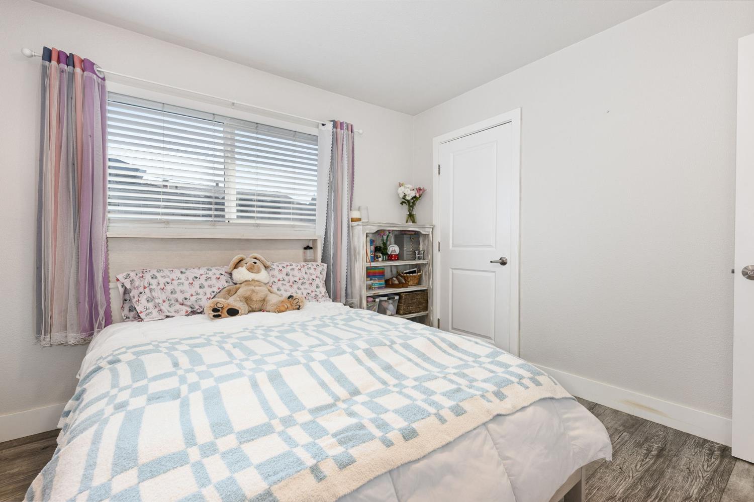 30 3rd Avenue Isleton, CA 95641 - Photo 15 of 42 a bedroom with a large bed and a closet