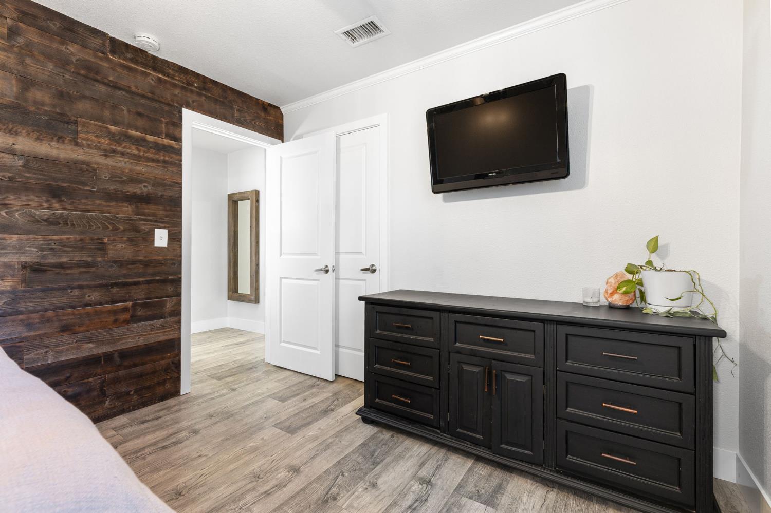 30 3rd Avenue Isleton, CA 95641 - Photo 18 of 42 a living room with furniture and a flat screen tv