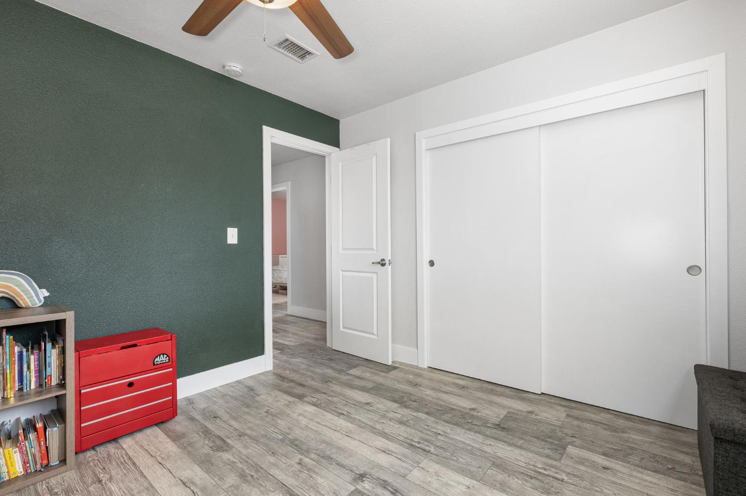 30 3rd Avenue Isleton, CA 95641 - Photo 22 of 42 a view of room with hardwood floor and cabinet
