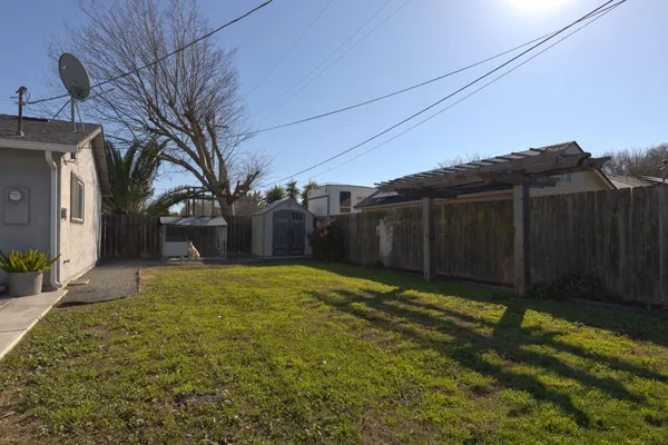 a view of backyard of house