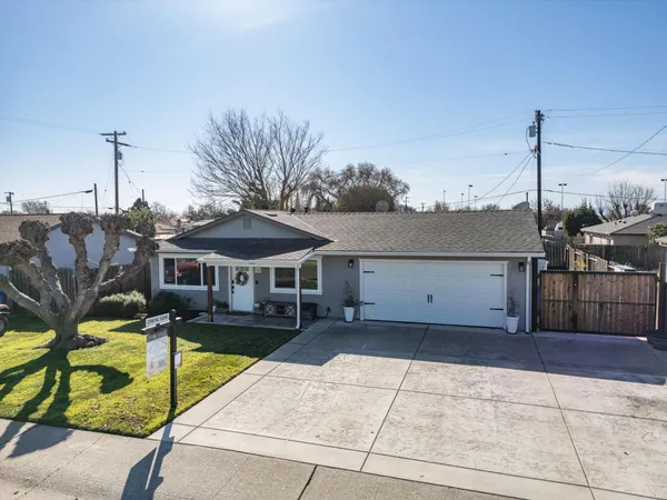 a front view of a house with swimming pool