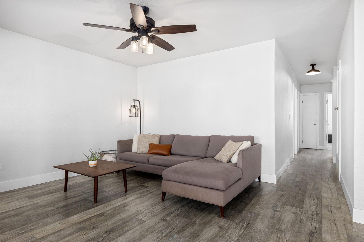 30 3rd Avenue Isleton, CA 95641 - Photo 6 of 42 a living room with furniture and a wooden floor