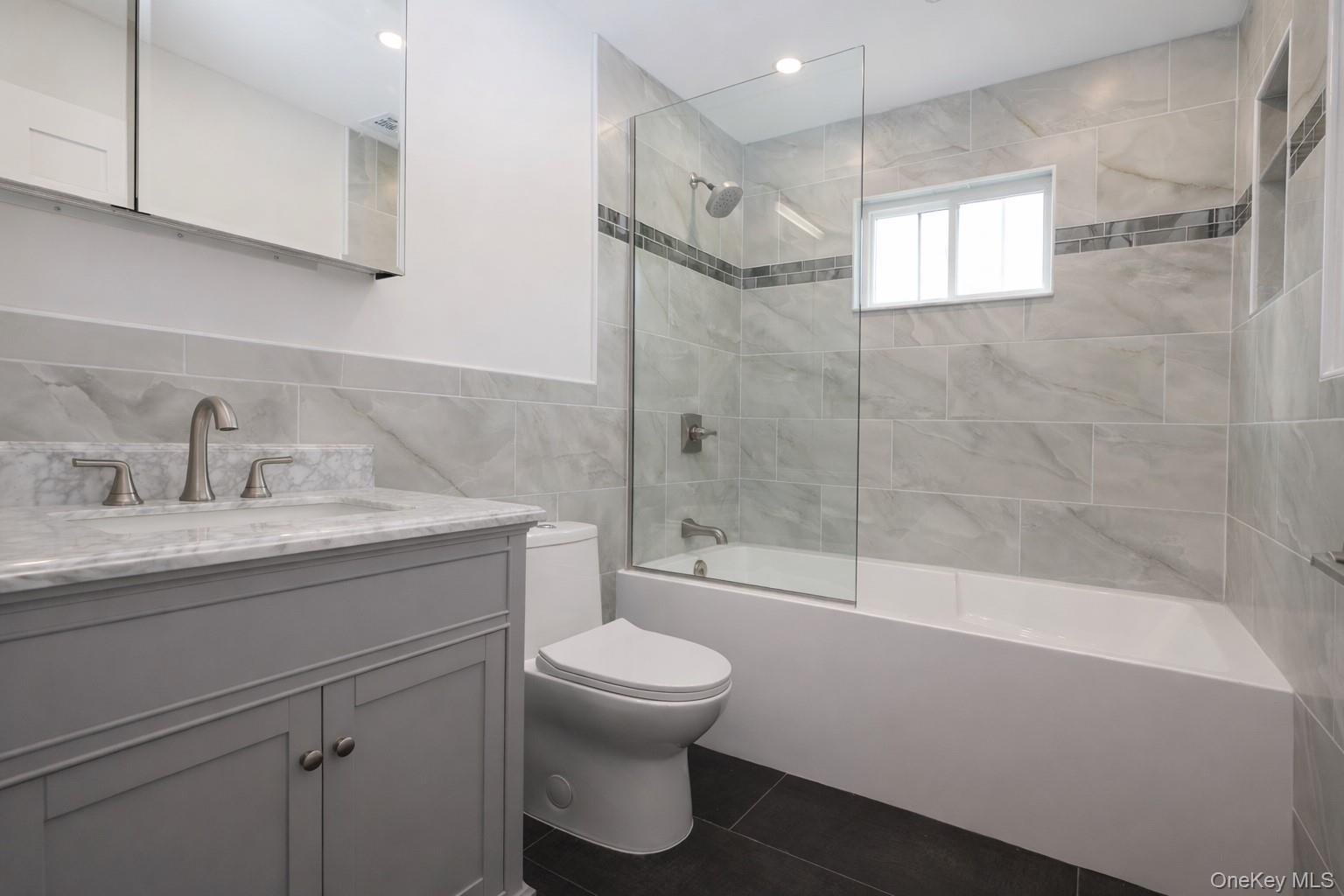 78 Ontario Road Floral Park, NY 11001 - Photo 20 of 33 Second Floor Bathroom with Large Soaking Tub and Custom Glass