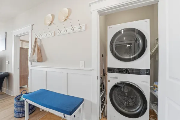 a view of a hallway with washer and dryer