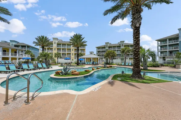 a view of a balcony with an ocean view