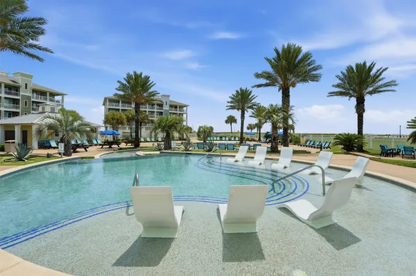 a view of a balcony with an ocean view