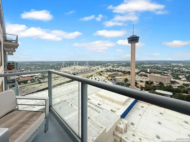 a view of a balcony with an ocean view