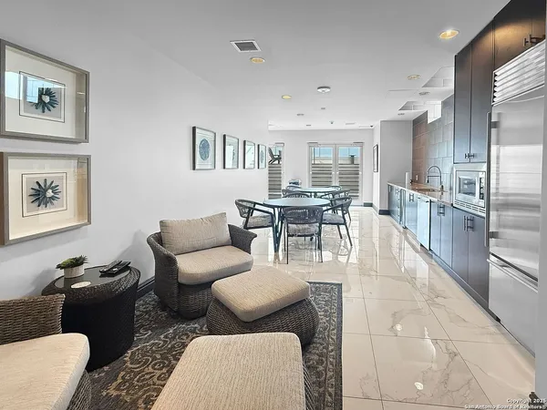 a living room with furniture and a table