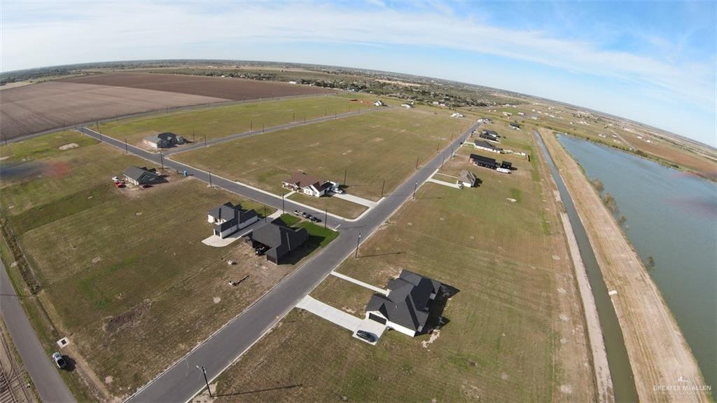 20232 Mile 4 West Edcouch, TX 78538 - Photo 2 of 7 an aerial view of residential houses with outdoor space