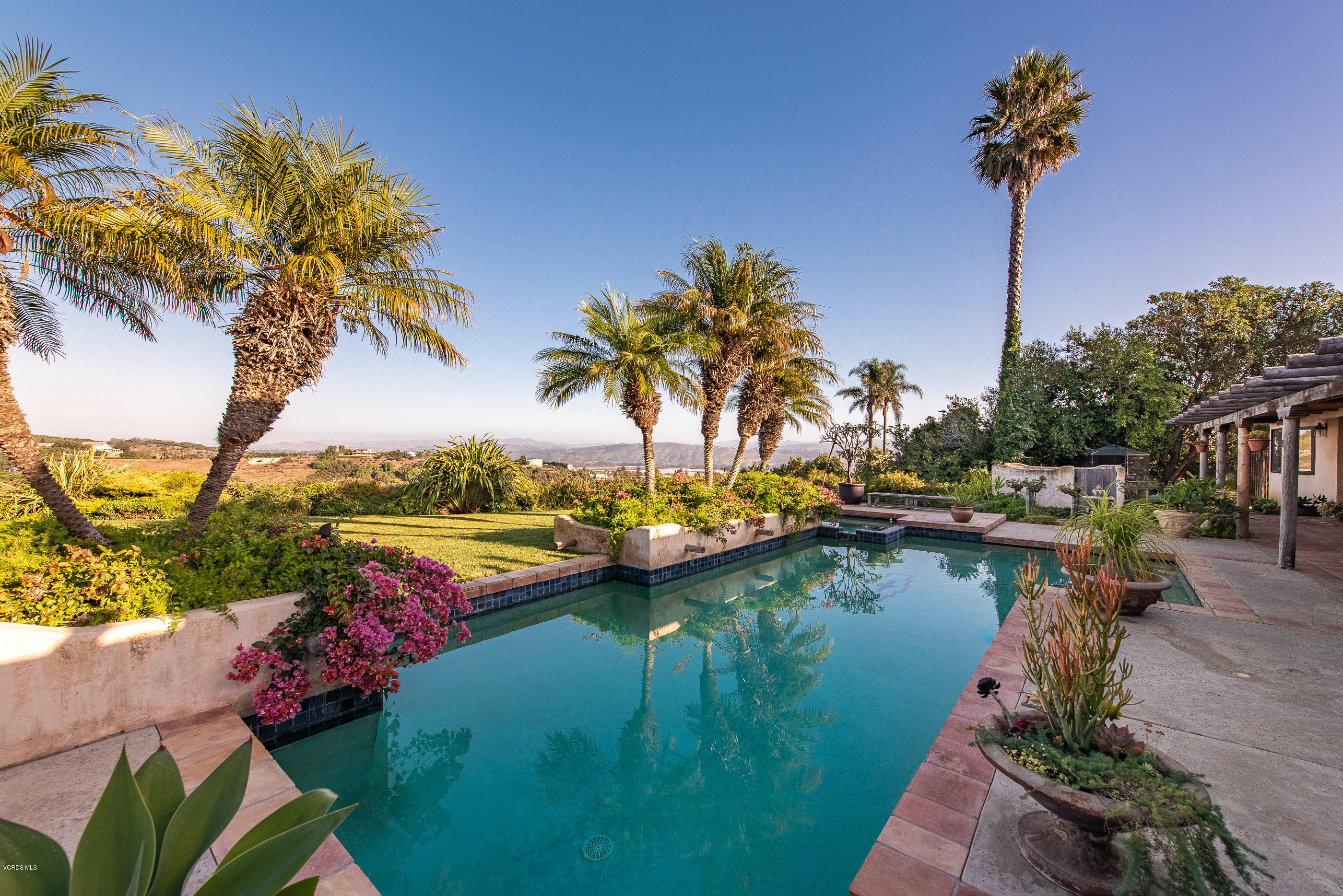 6138 West Greentree Drive Somis, CA 93066 - Photo 11 of 61 a view of a lake with a house