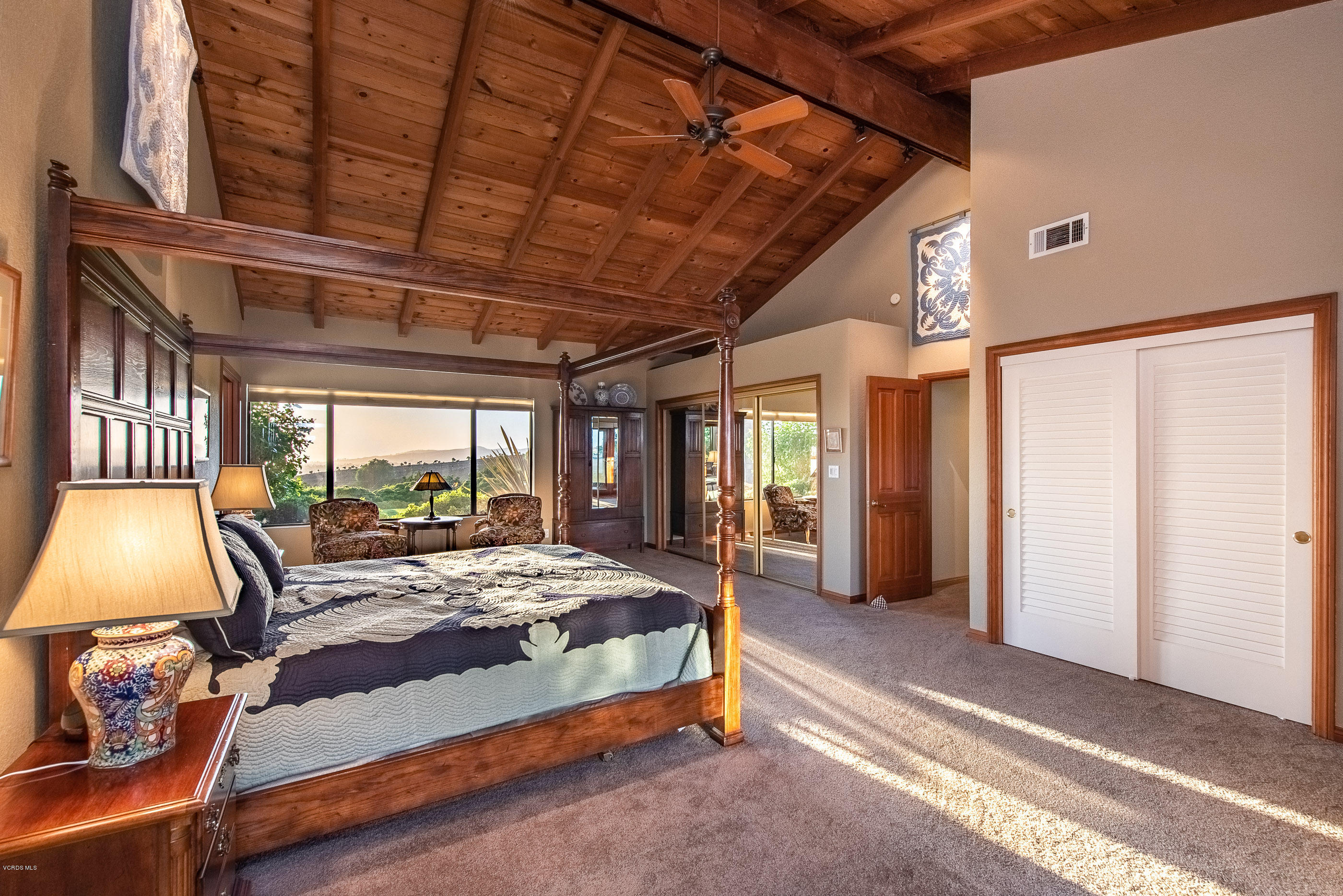 6138 West Greentree Drive Somis, CA 93066 - Photo 20 of 61 a bed sitting in a spacious bedroom next to a window