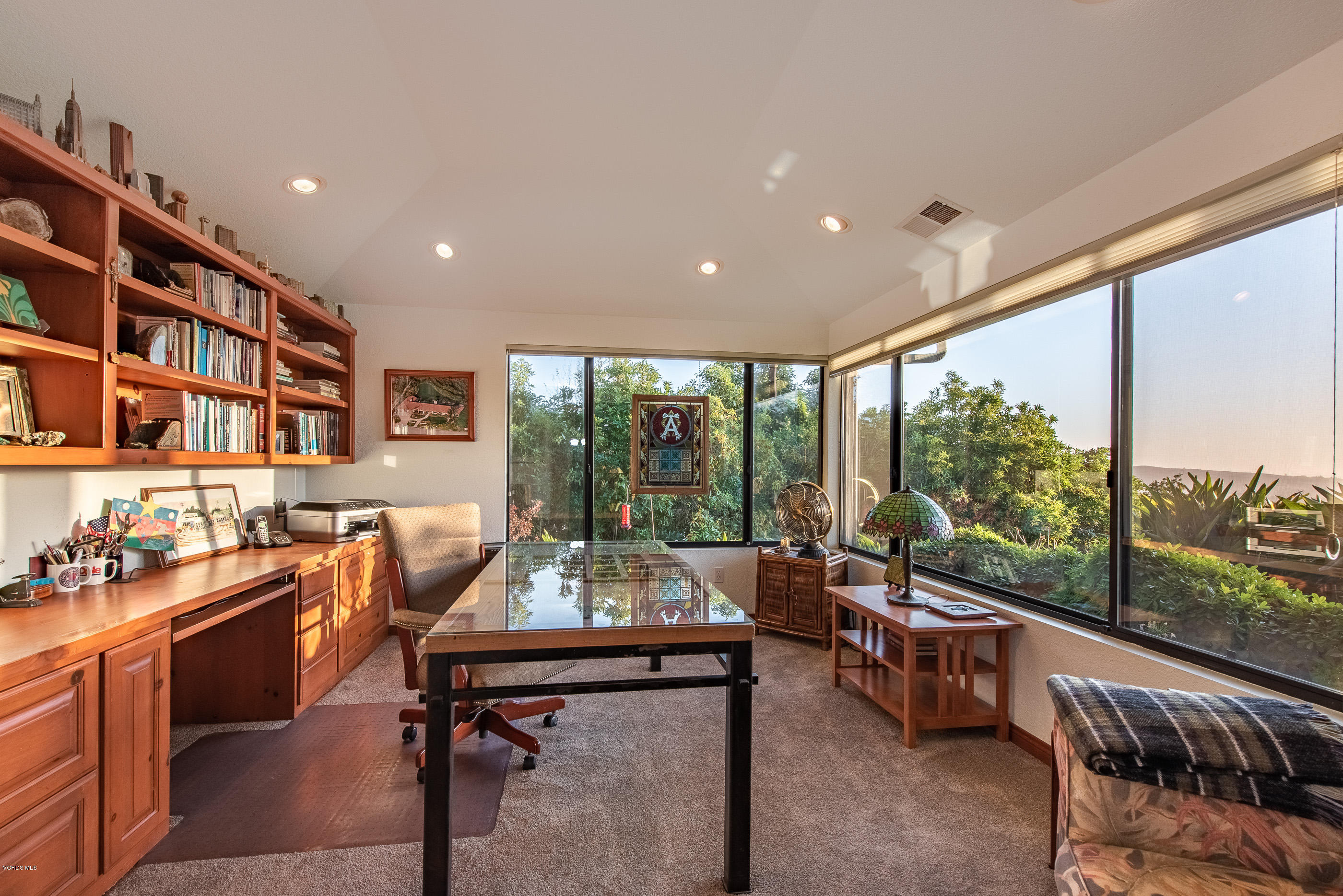 6138 West Greentree Drive Somis, CA 93066 - Photo 24 of 61 a living room with furniture city view and large windows