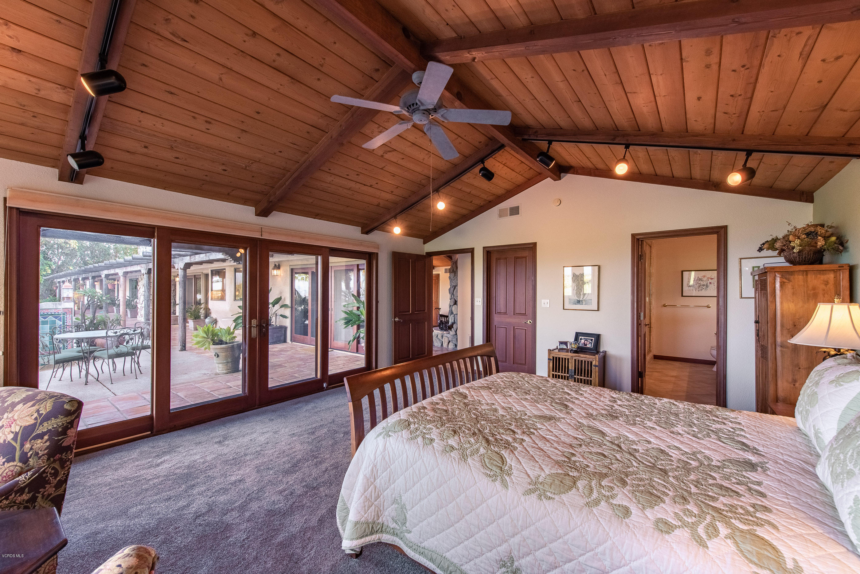 6138 West Greentree Drive Somis, CA 93066 - Photo 28 of 61 a spacious bedroom with a large bed and a large window