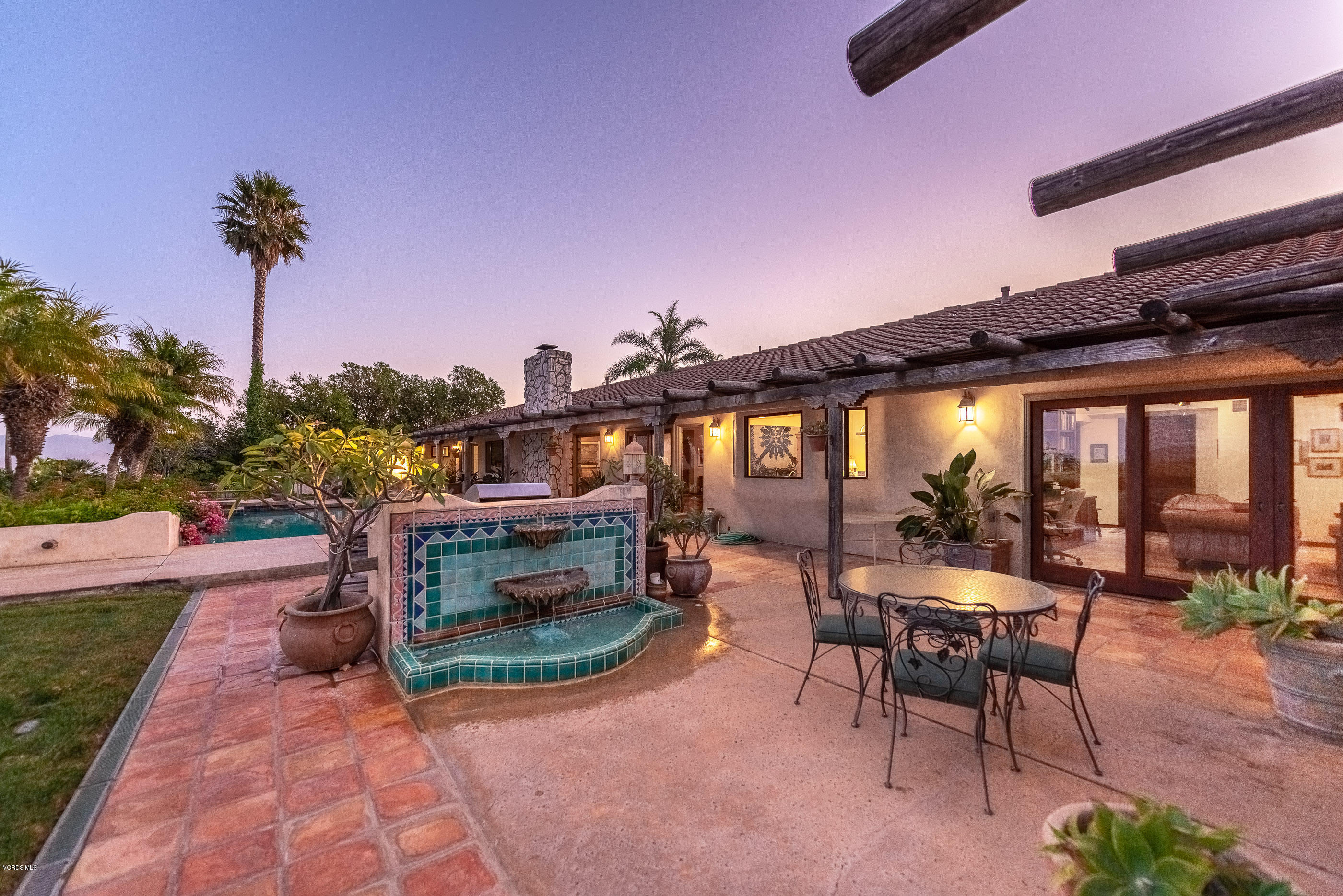 6138 West Greentree Drive Somis, CA 93066 - Photo 31 of 61 a view of a patio with a table and chairs