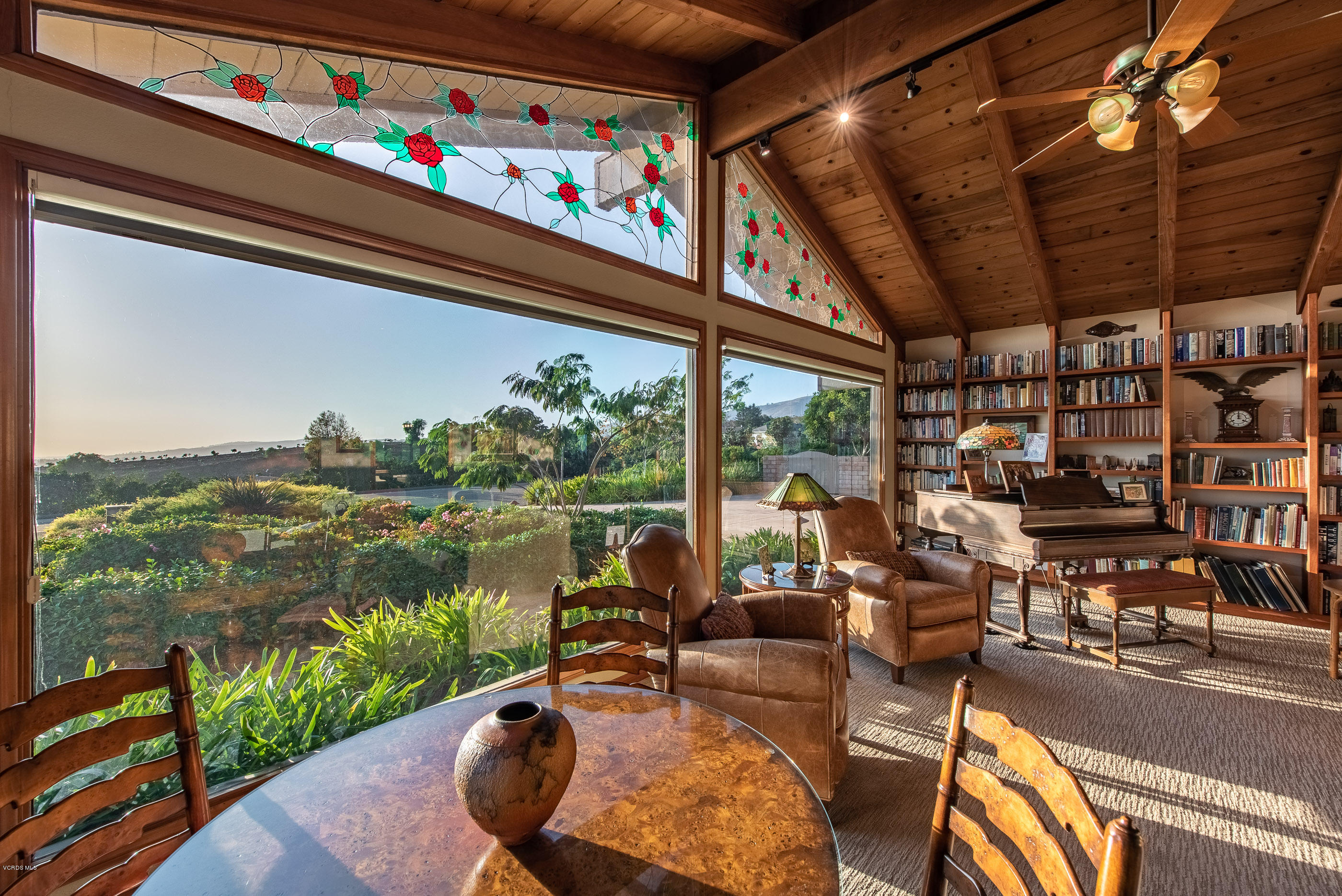 6138 West Greentree Drive Somis, CA 93066 - Photo 33 of 61 a living room with patio furniture and a floor to ceiling window