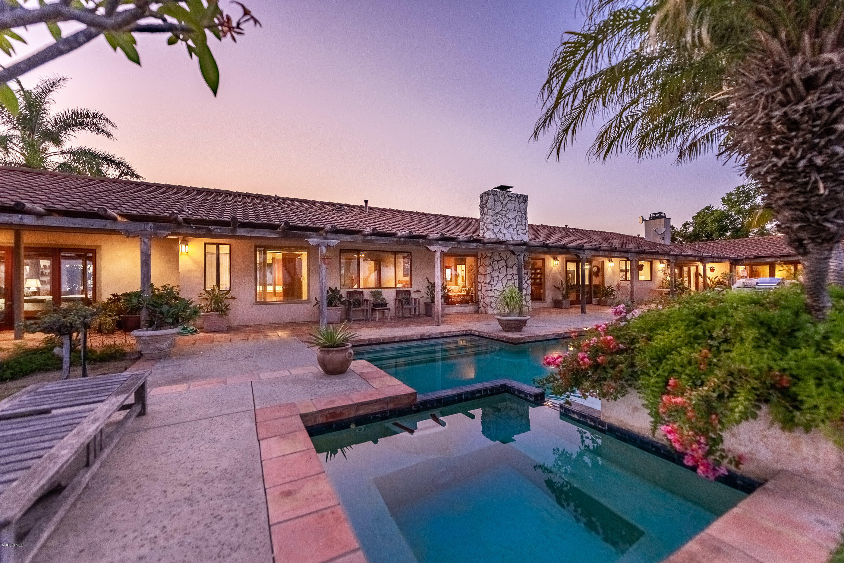 6138 West Greentree Drive Somis, CA 93066 - Photo 55 of 61 a view of swimming pool with outdoor seating and a garden