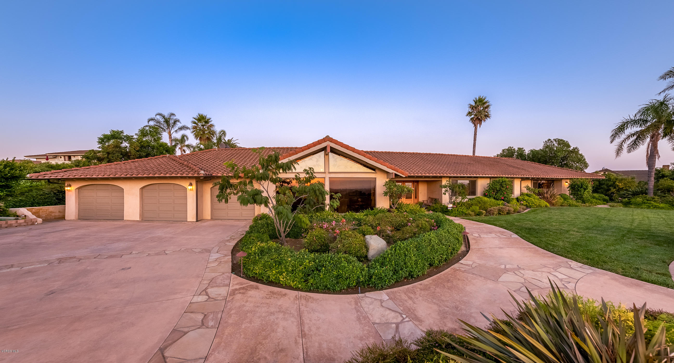 6138 West Greentree Drive Somis, CA 93066 - Photo 56 of 61 a front view of a house with a yard