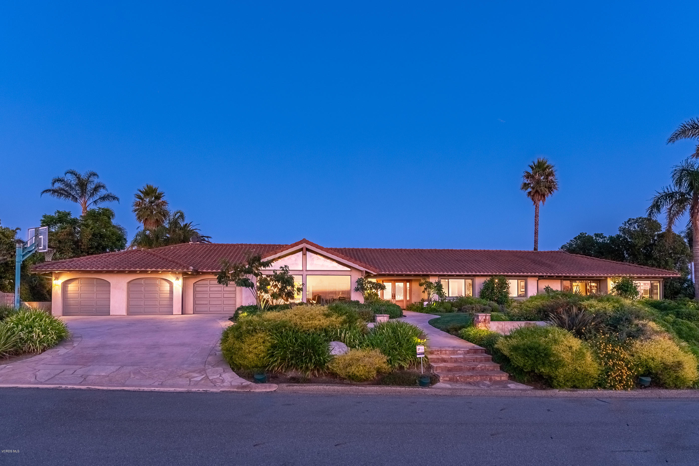 6138 West Greentree Drive Somis, CA 93066 - Photo 59 of 61 a front view of a house with a yard