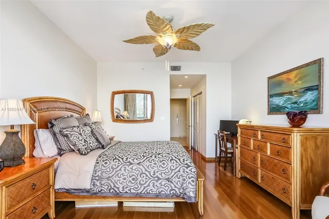 a balcony with an outdoor seating