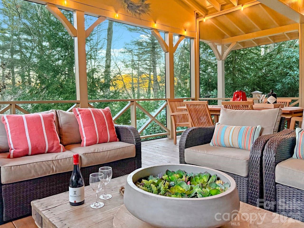 a outdoor living space with furniture and city view