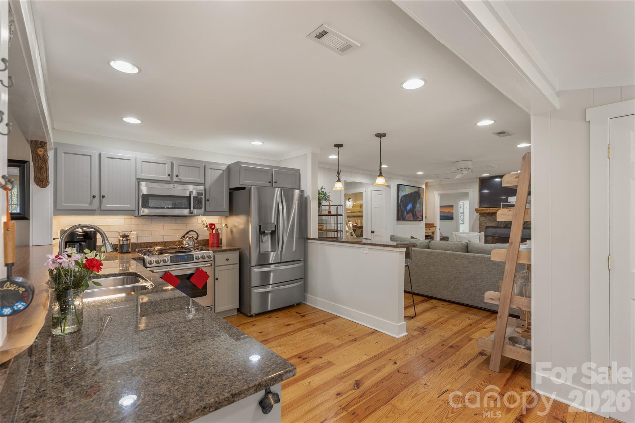 464 Franklin Road Highlands, NC 28741 - Photo 16 of 44 a kitchen with refrigerator and cabinets