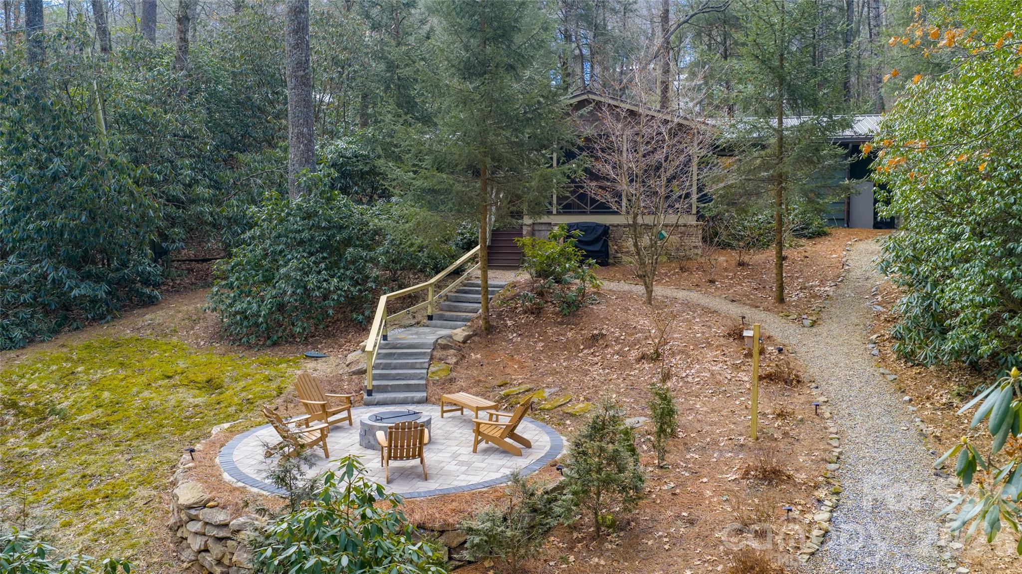 464 Franklin Road Highlands, NC 28741 - Photo 2 of 44 a view of a house with a yard