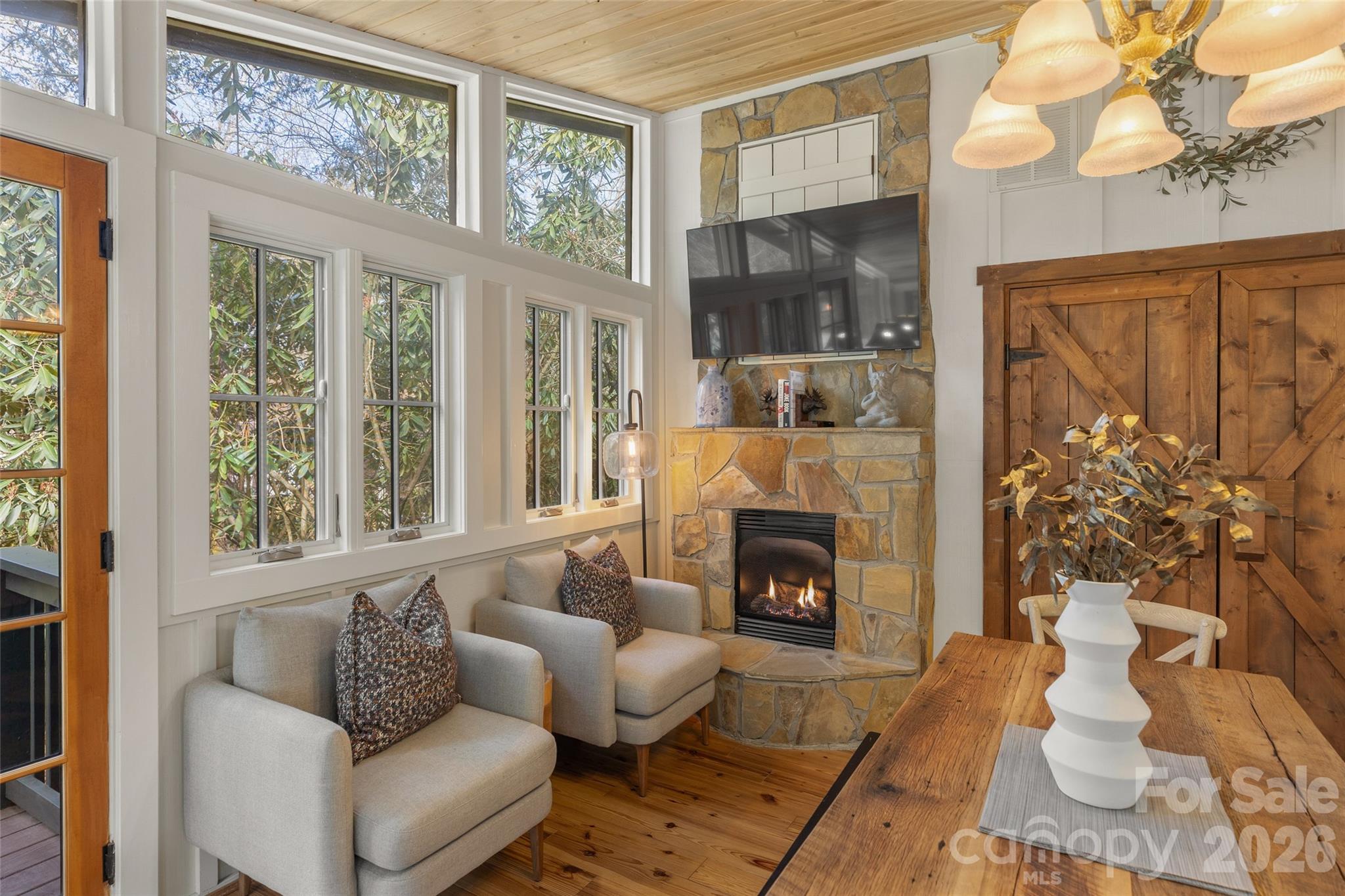 464 Franklin Road Highlands, NC 28741 - Photo 26 of 44 a living room with furniture and a fireplace