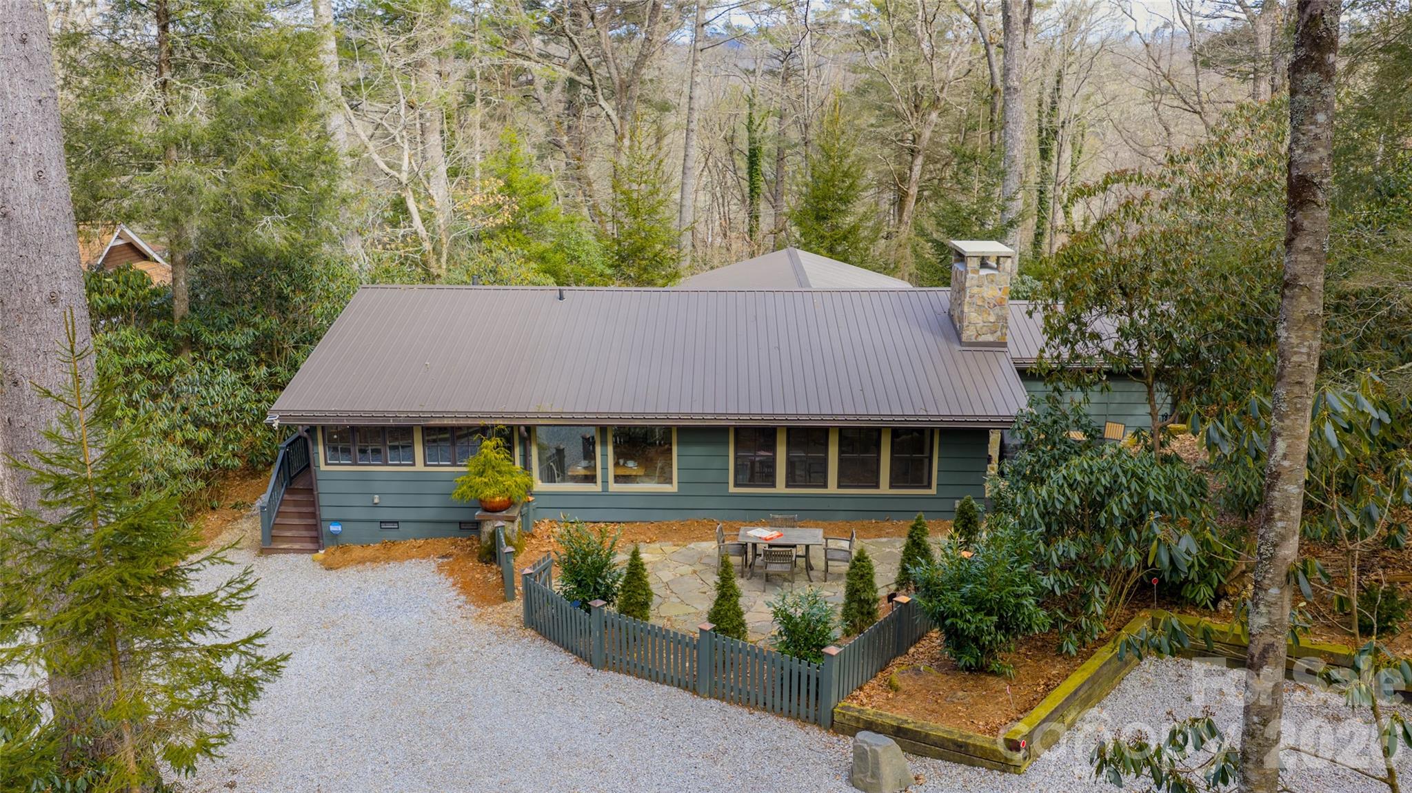 464 Franklin Road Highlands, NC 28741 - Photo 41 of 44 front view of a house with a yard