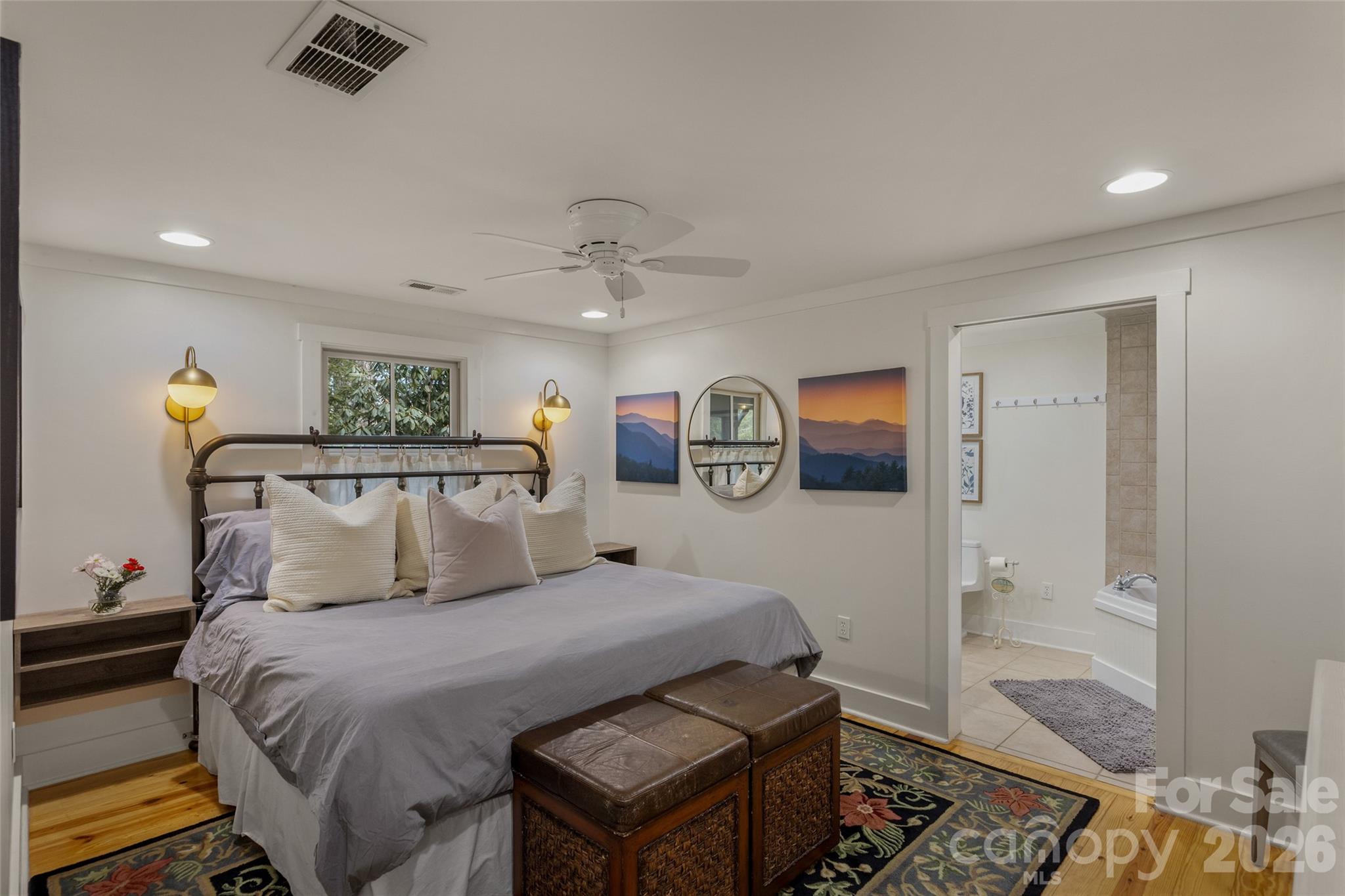 464 Franklin Road Highlands, NC 28741 - Photo 6 of 44 a bedroom with a large bed and a window