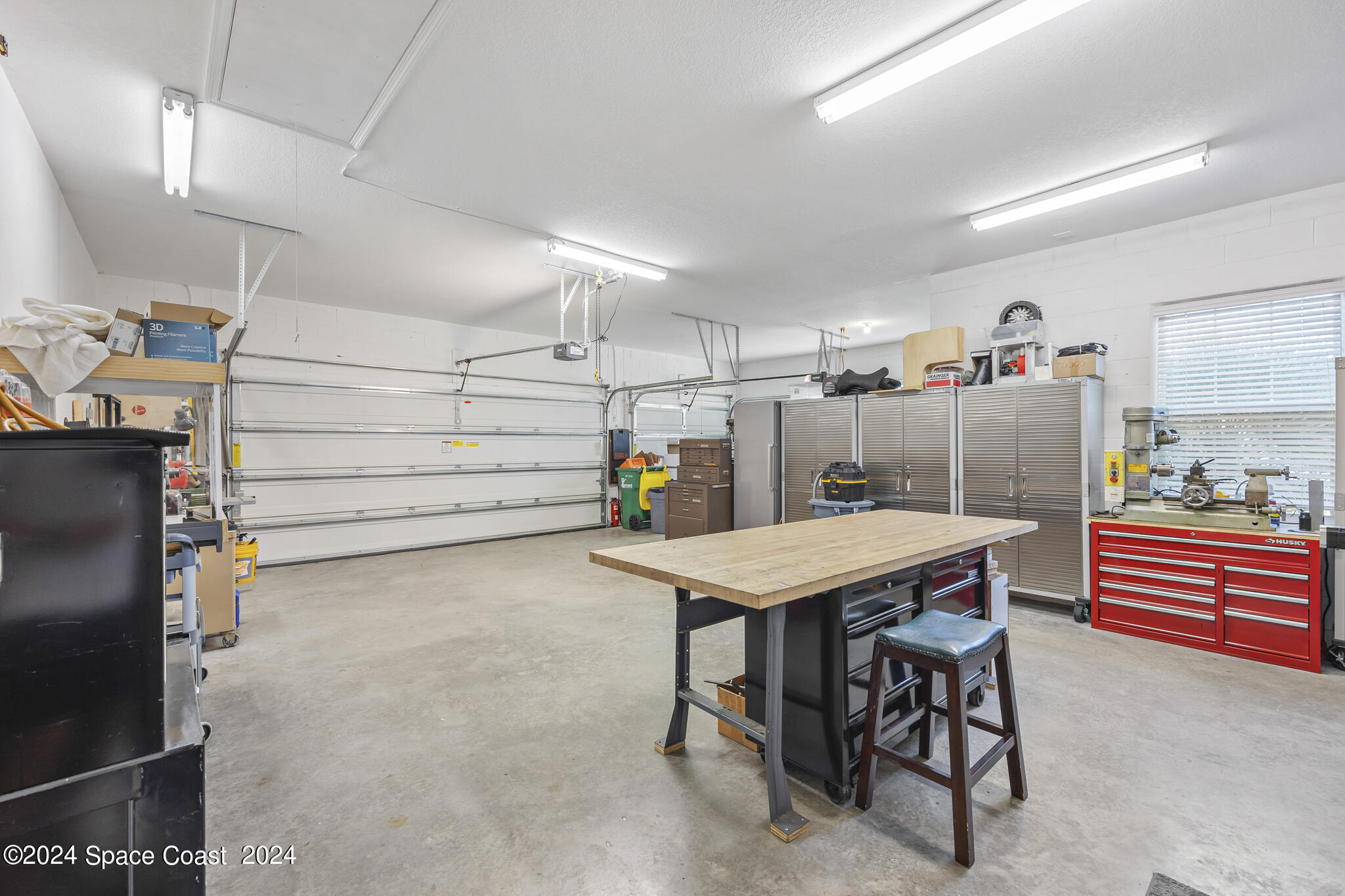 4227 Preservation Circle Melbourne, FL 32934 - Photo 41 of 50 WORKSHOP & THREE CAR GARAGE