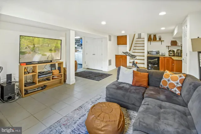 a view of a house with patio and a yard