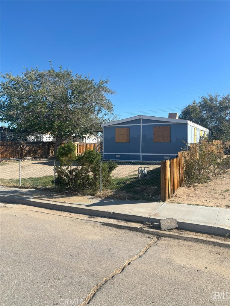 1405 West St George Avenue Ridgecrest, CA 93555 - Photo 2 of 27 a view of a house with a street