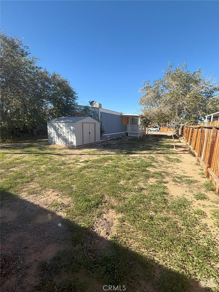 1405 West St George Avenue Ridgecrest, CA 93555 - Photo 26 of 27 a view of a large swimming pool with an ocean view
