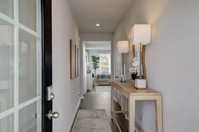 a spacious bathroom with a sink a mirror and a shower