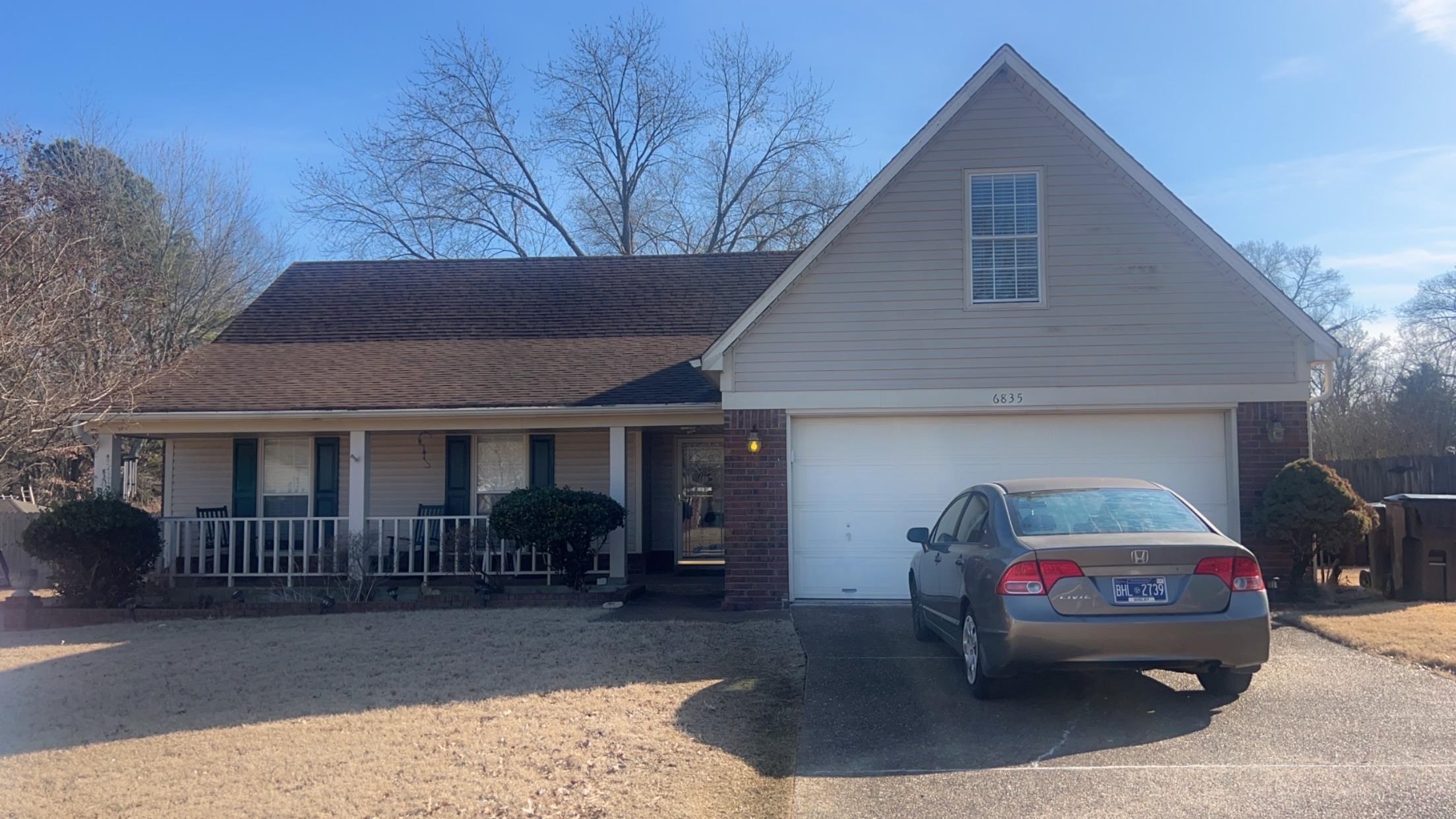 6835 Andrews Road Bartlett, TN 38135 - Photo 11 of 12 View of front of house featuring a porch and a garage