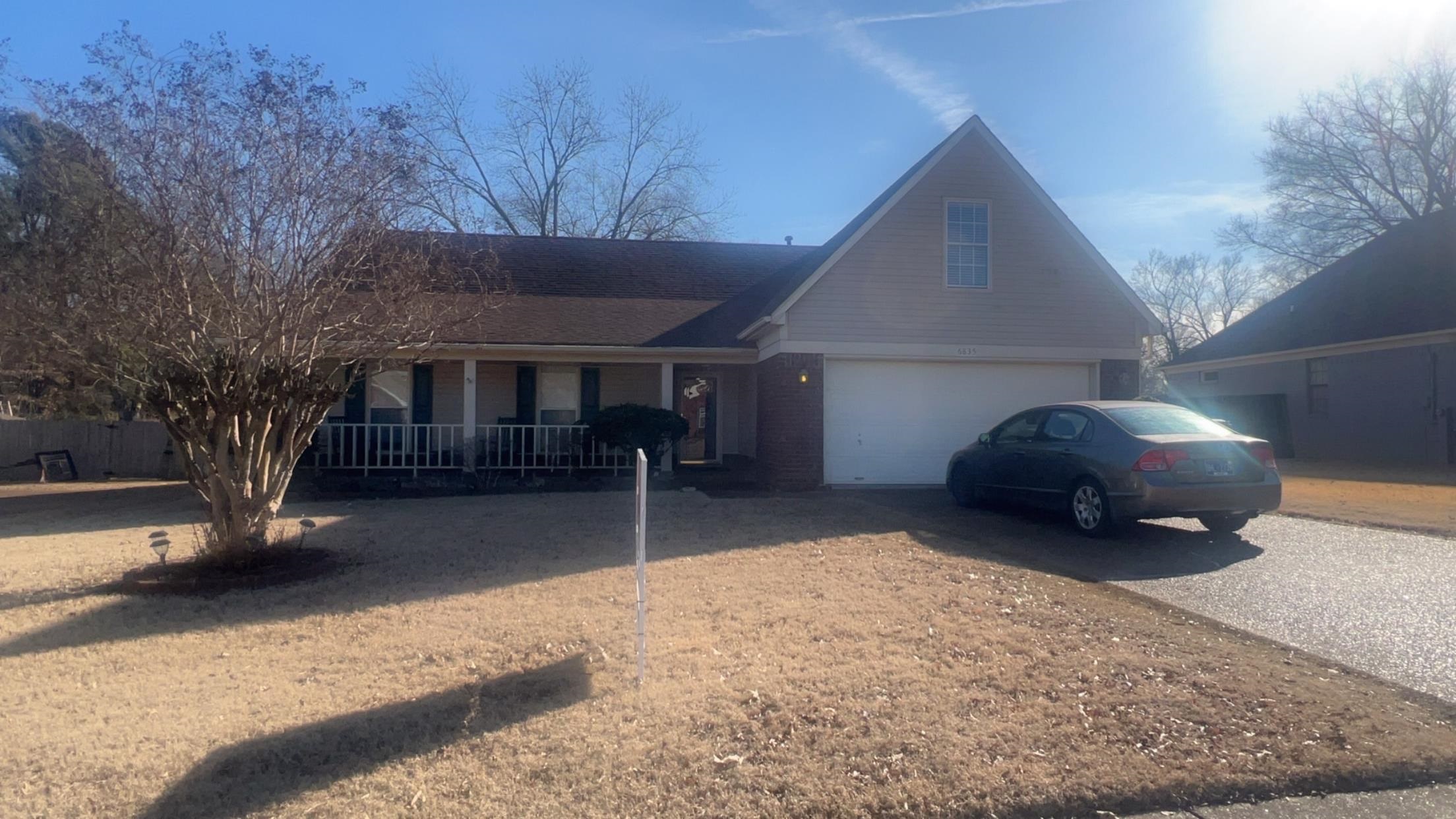 6835 Andrews Road Bartlett, TN 38135 - Photo 10 of 12 Front of property featuring a garage and covered porch