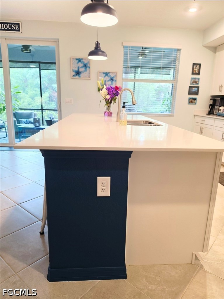 14191 Poppy Fld Loop, Unit 5312 Punta Gorda, FL 33955 - Photo 9 of 41 a room with a sink and a large mirror