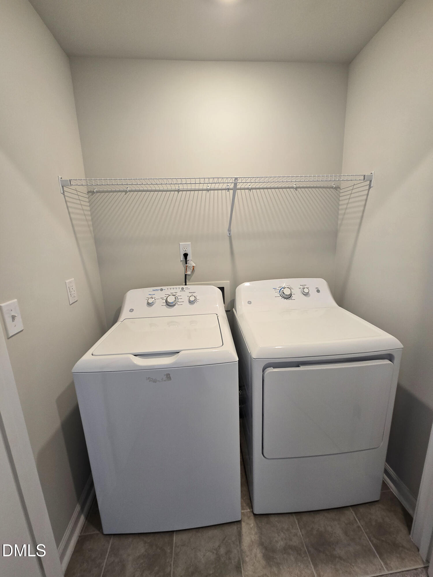 2431 Kasota Lane Raleigh, NC 27610 - Photo 45 of 46 a utility room with dryer and washer